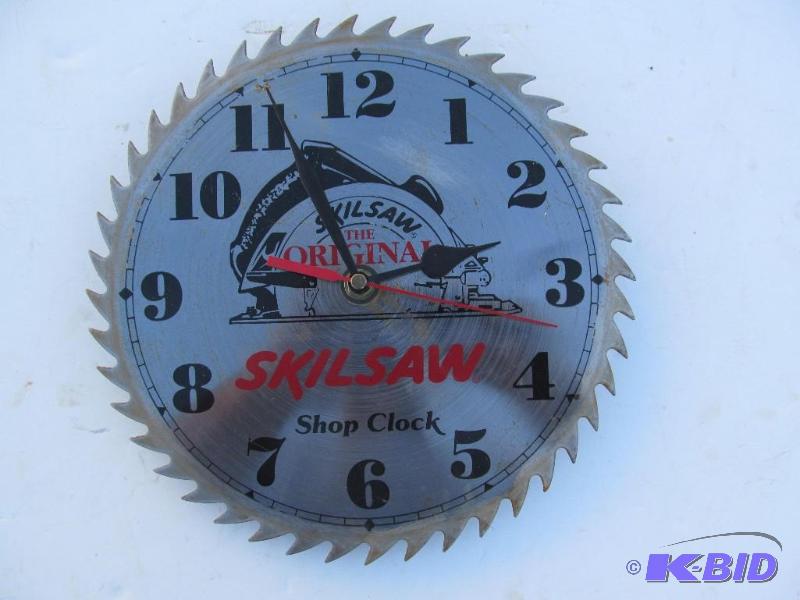 lot 17 image: Sklisaw wall clock.