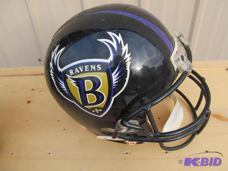 lot 61 image: Baltimore Ravens football helmet....