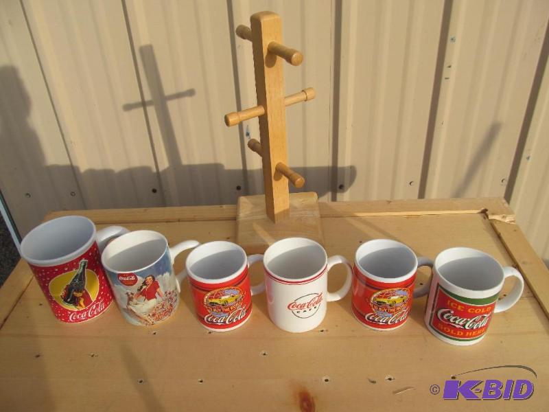 lot 66 image: Assortment of collectable Coca-Cola mugs....