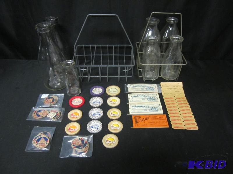 lot 00049 image: Group of Glass Milk Containers Coupons, Bottle Caps and Carriers