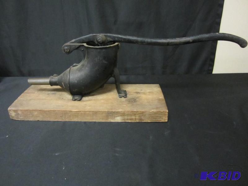 lot 00091 image: Antique Sausage Stuffer on Wood Base