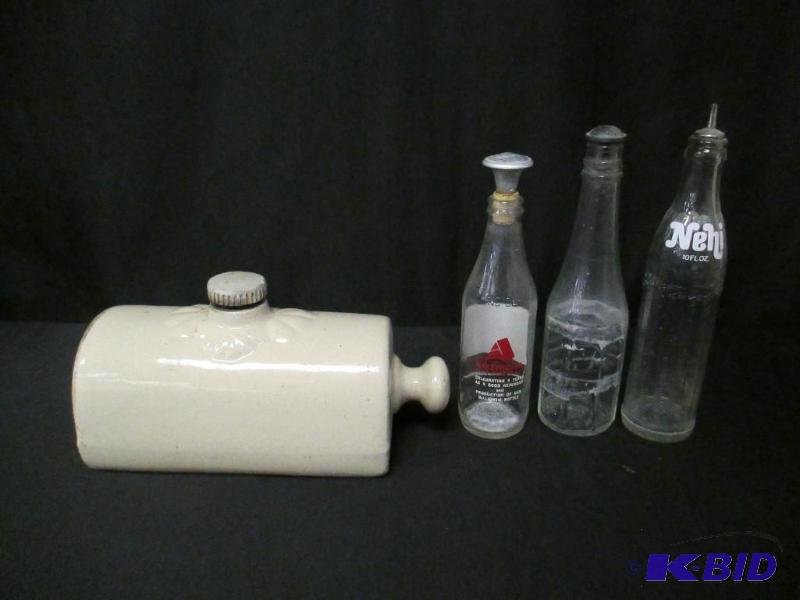 lot 123 image: Lot of Vintage Soda Bottles with Sprinklers Stoneware Bed Warmer Foot