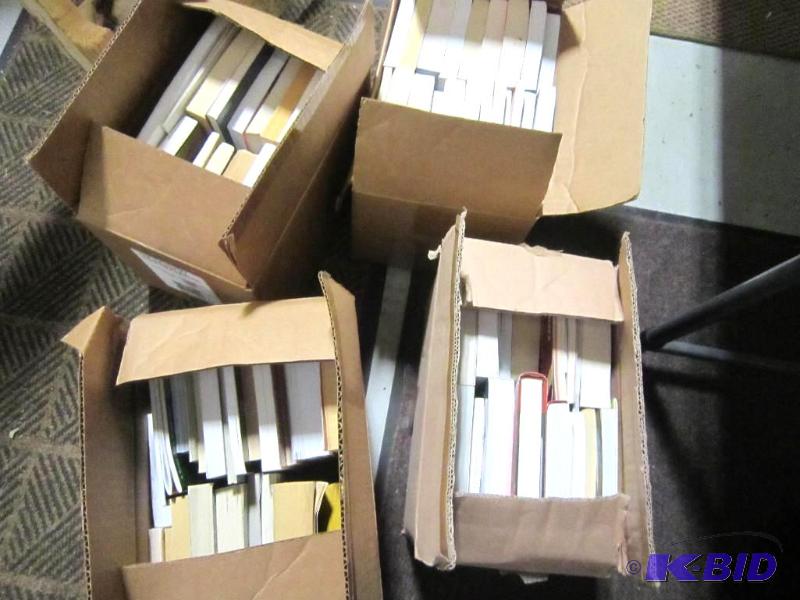 4 boxes of Paperback Books