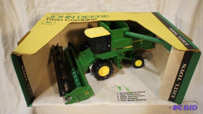 lot 1 image: New In Box John Deere Titan Combine # 524 - 1...