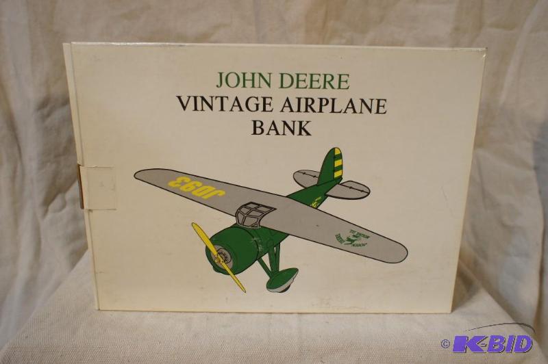 lot 18 image: John Deere Vintage Airplane Bank - #35024. Pl...