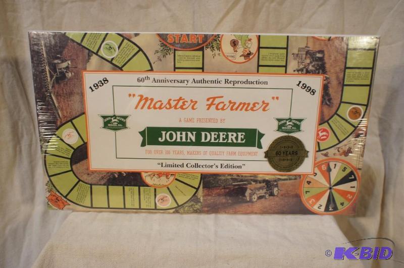 lot 20 image: New & Sealed -John Deere Master Farmer Bo...