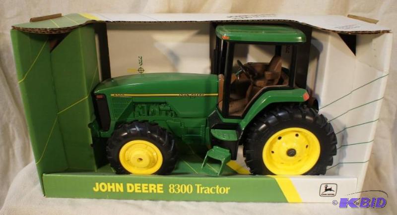 lot 45 image: New In Box John Deere 8300 Tractor - 116 Sca...
