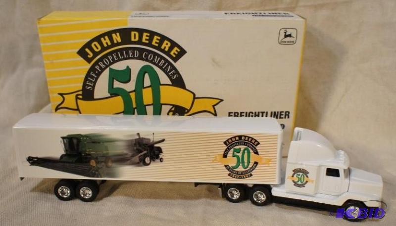 lot 50 image: John Deere Freight liner Diecast Tractor Trai...
