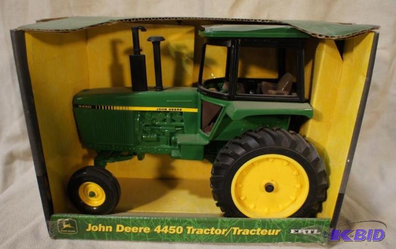 lot 57 image: New In Box John Deere 4450 Tractor - 116 sca...