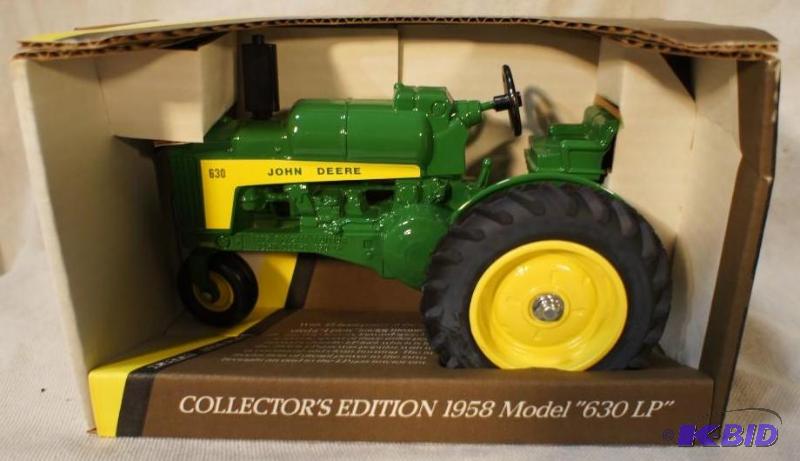 lot 74 image: New In Box John Deere CE 1958 Model 630LP Tra...