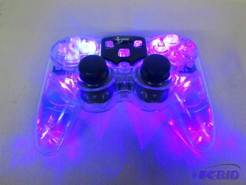 lot 42 image: PS2 Blue Lava Glow Wireless Controller
