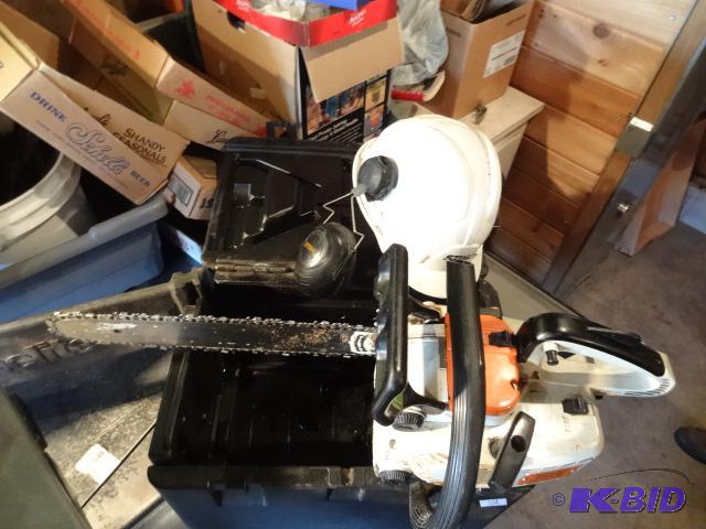 lot 58 image: Stihl 009 16" Chain Saw. Comes with case...