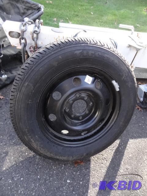 lot 9 image: Brand New Firestone Tire P18565R14. 4 Hole U...