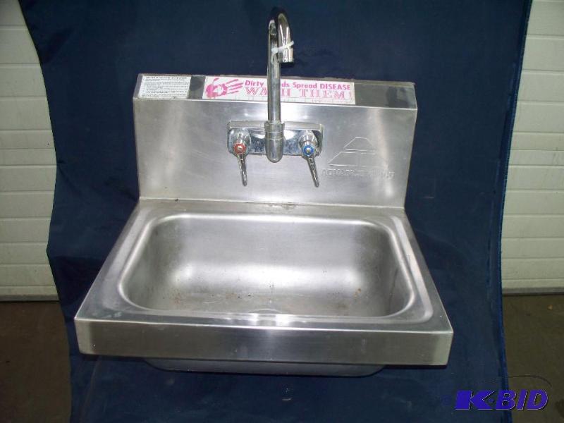 lot 101 image: Stainless sink with faucet...