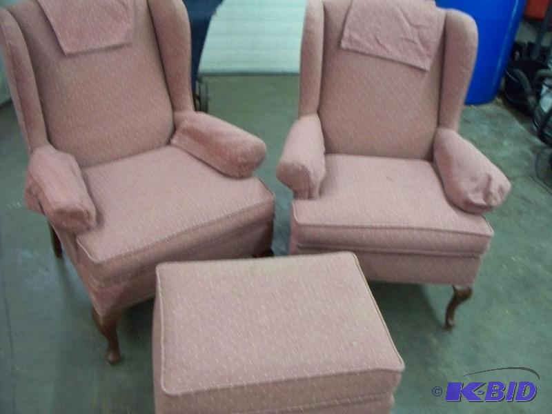 lot 105 image: 2- chairs with 1-foot rest nice shape...