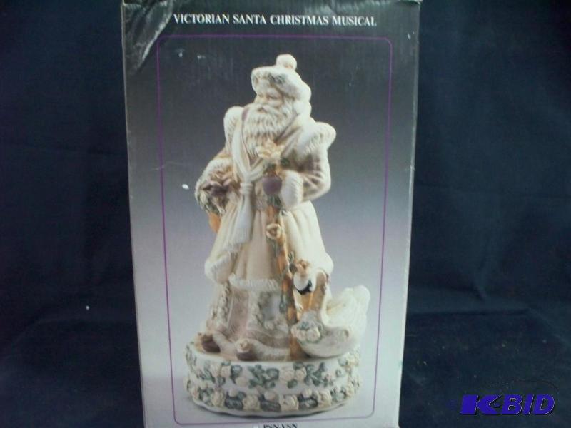 lot 21 image: Victorian Santa Christmas Musical in box...