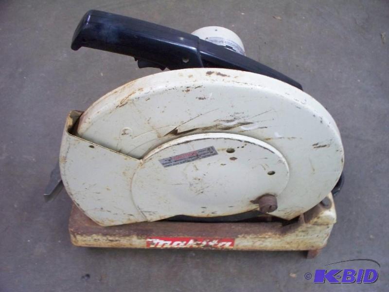 lot 27 image: Makita 14" chop saw works...