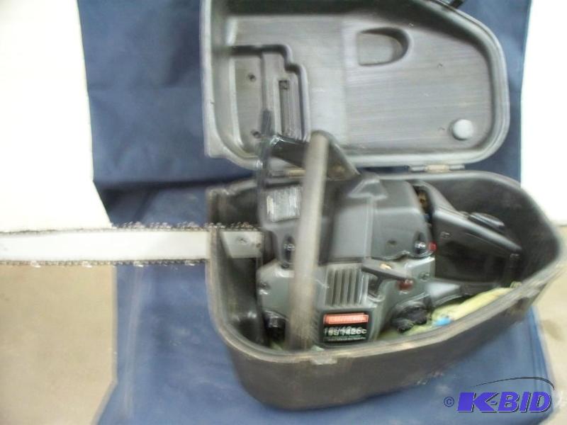 lot 9 image: Craftsman chain saw and case works great...