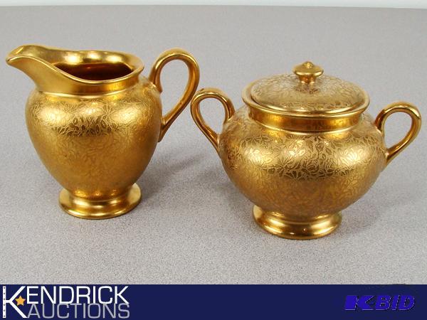 lot 144 image: Wheeling Floral Gold Gilded Cream and Sugar Set