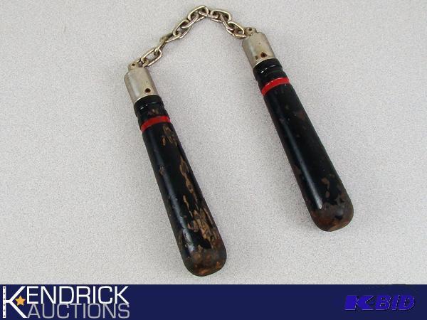 lot 31 image: Vintage Wood Nunchucks