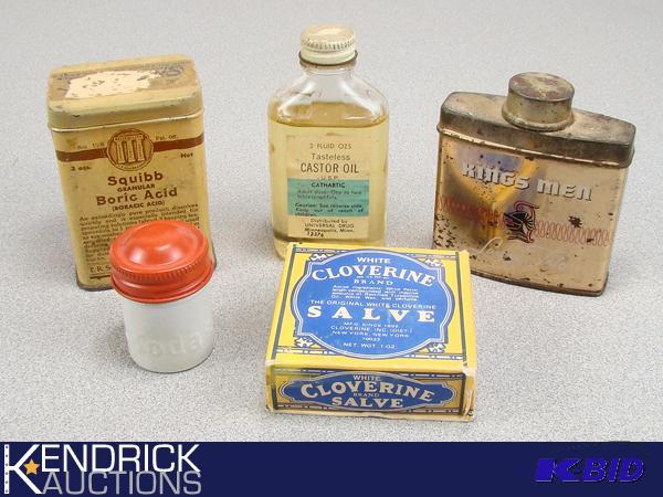 lot 39 image: Lot of Vintage Snake Oil TinsBottles