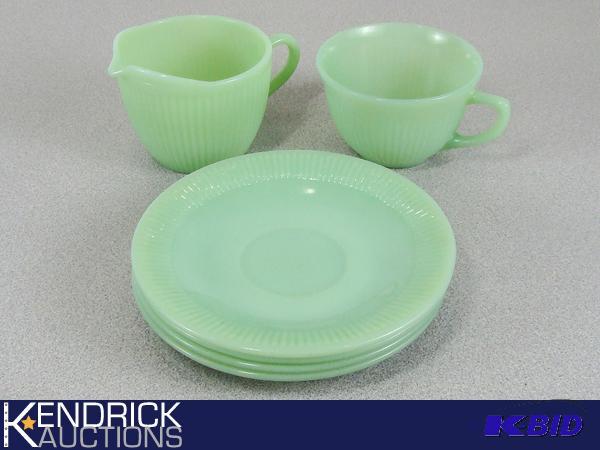 lot 55 image: Vintage Fire King Jadeite Sugar Bowl, Creamer, and 4 Saucers