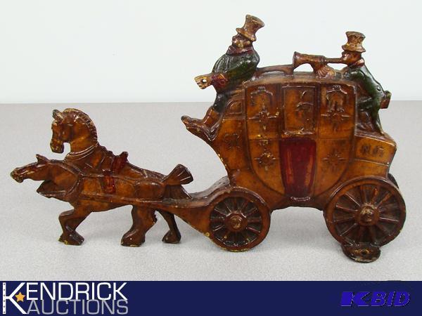 lot 76 image: Antique Cast Iron Wagon Door Stop