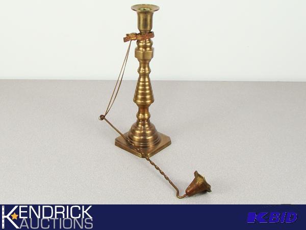 lot 93 image: Solid Brass Candle Holder with Attached Brass Snuffer