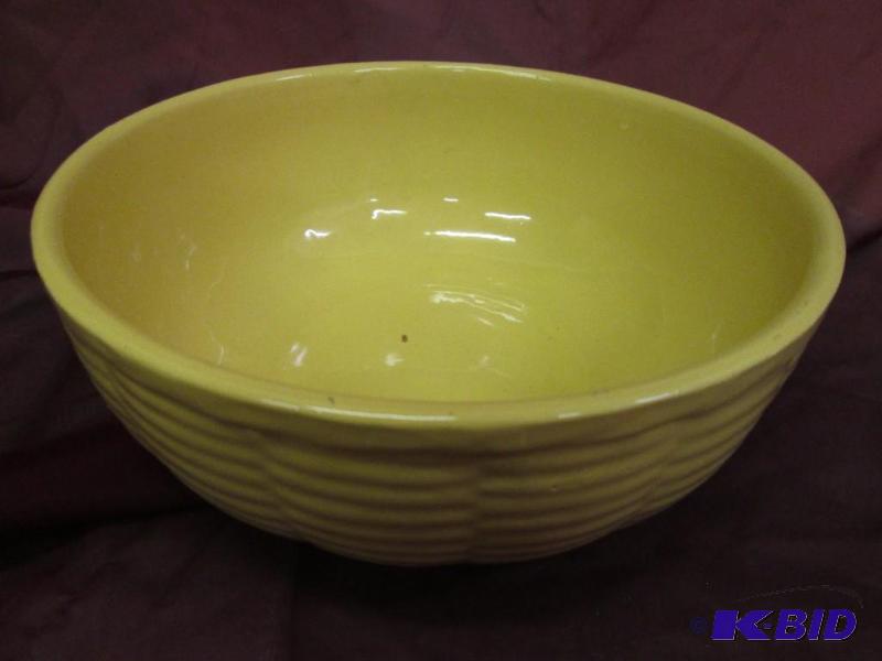 lot 143 image: Watt #102 yellow bowl, 9.5...