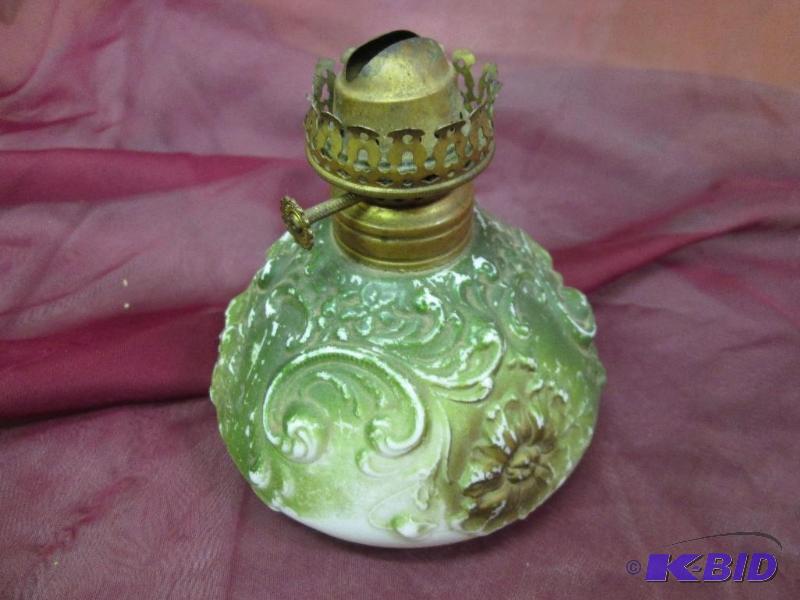lot 153 image: Oil lamp with green base...