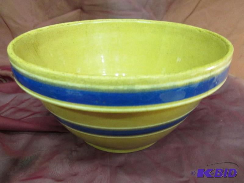 lot 154 image: Brown bowl with blue stripe  10.5...