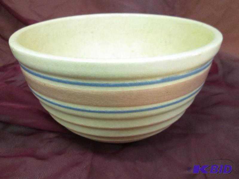 lot 200 image: Pink and blue striped bowl...