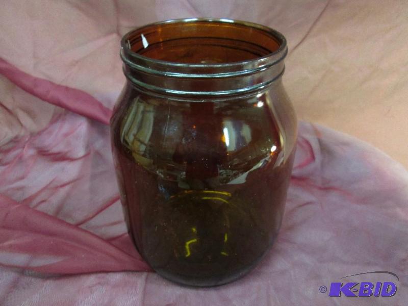 lot 201 image: Brown glass jar, 8.5 inch tall...