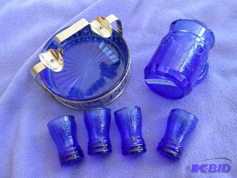 lot 228 image: Cobalt blue pitcher and mini glasses...