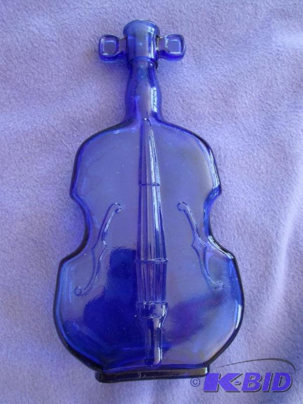 lot 229 image: Blue instrument bottle, 8 tall...