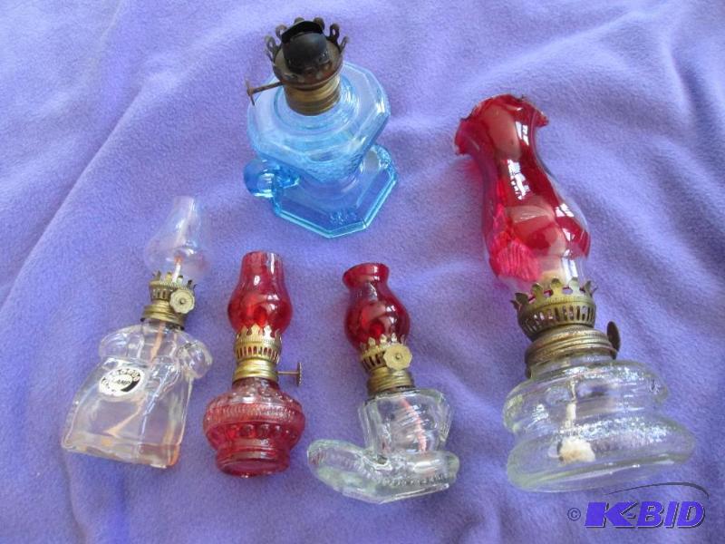 lot 235 image: Assortment of small oil lamps...