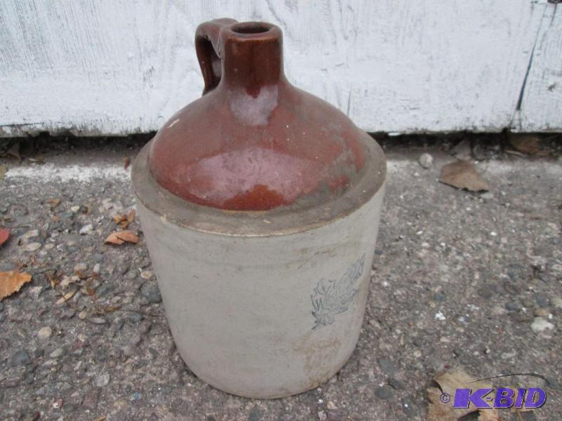 lot 26 image: 11" tall jug by Western Stoneware...