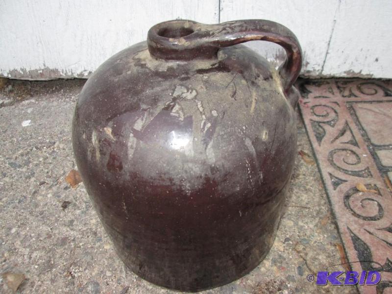 lot 28 image: Brown jug, 12" tall...