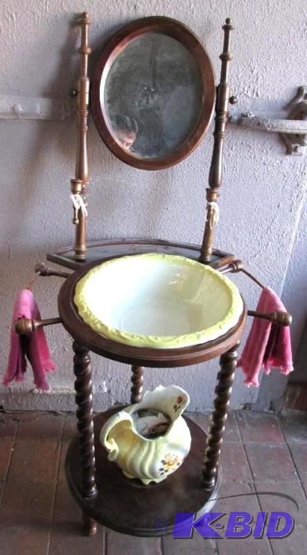 lot 32 image: Antique Shaving bowl with pitcher, on wood st...