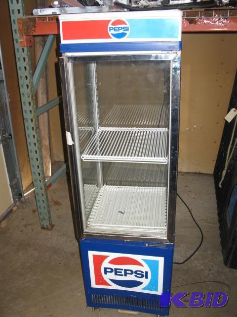 lot 29 image: Pop-Beverage fridge, lights up, fan runs, adj...