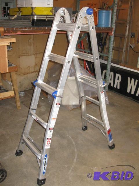 lot 31 image: Werner 300 lb capacity adjustable ladder, lik...