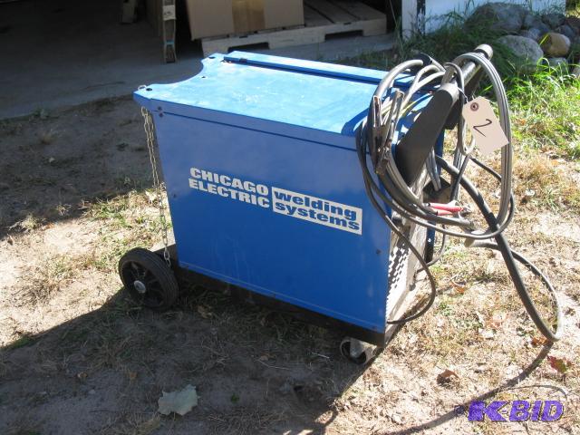 lot 48 image: Chicago Electric Dual mig 171 welder on caste...