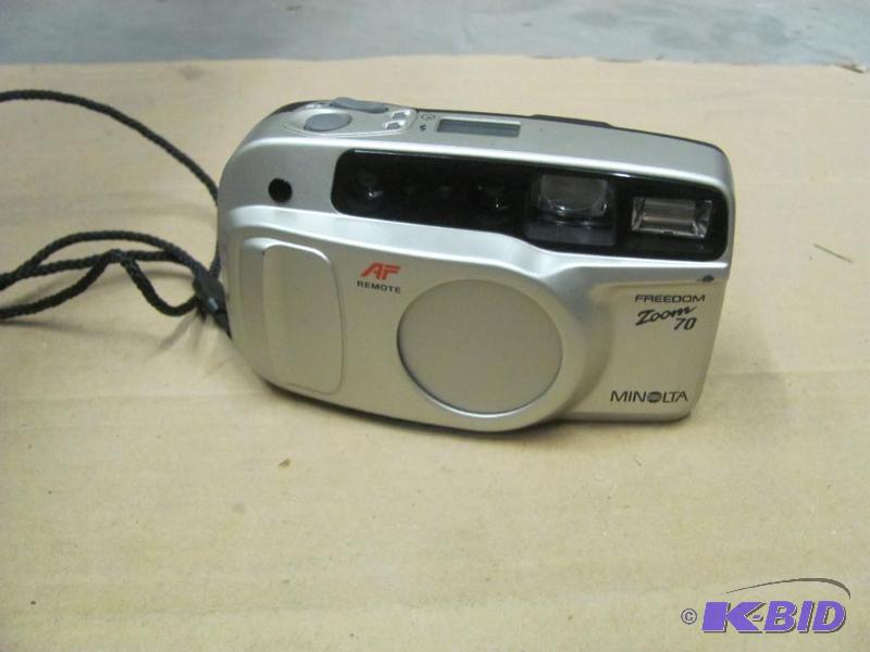 lot 113 image: MINOLTA Freedom Zoom 70 35mm Camera. Powered ...