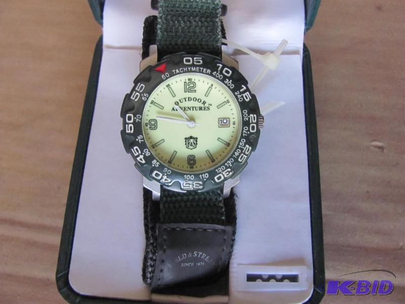 lot 13 image: This OUTDOOR ADVENTURES Luminated Watch from ...
