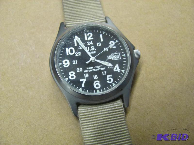 lot 37 image: Stainless Army Watch. Previously used and not...