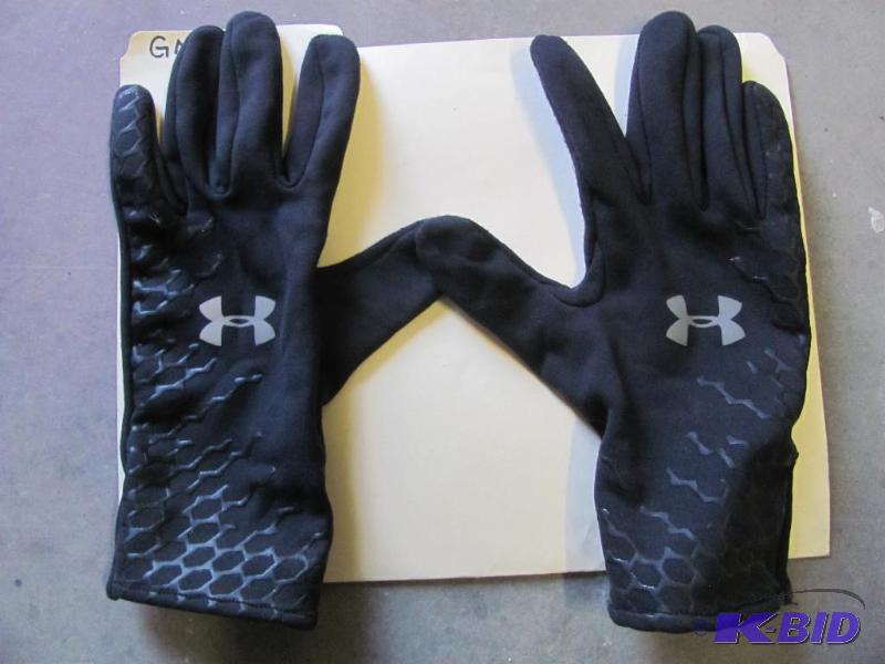lot 52 image: Stay warm, dry and focused with these UNDER A...