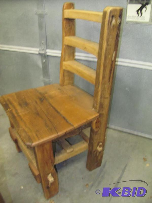 lot 75 image: This oversized one-of-a-kind Wood Chair is on...