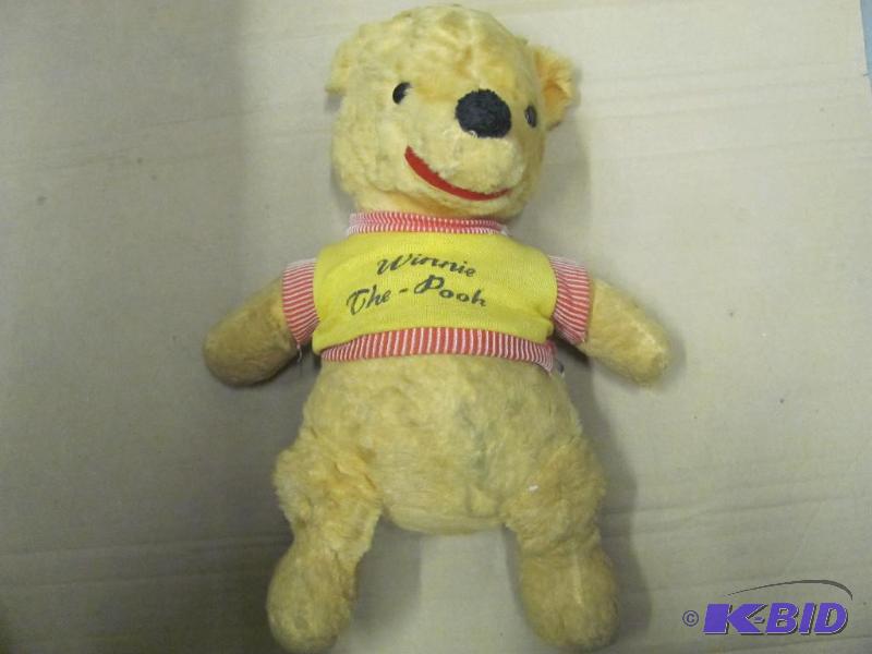 lot 91 image: This GUND Winnie-the-Pooh Bear from 1964 is i...