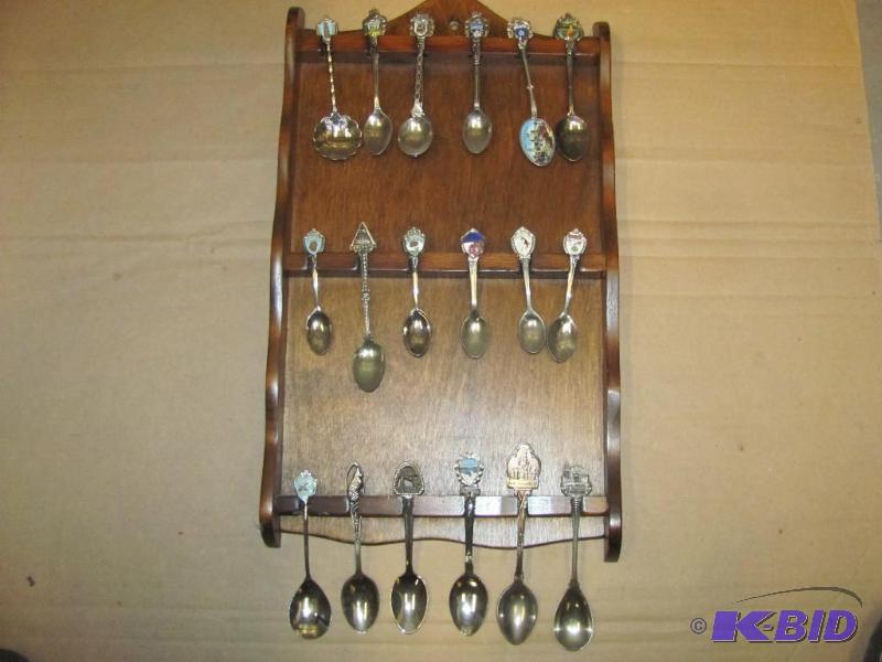 lot 94 image: Eighteen (18)-Piece Spoon Collection on woode...