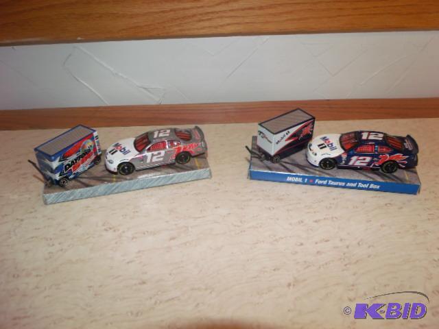 Ryan Newman  Mobil 1 cars with pit boxes
